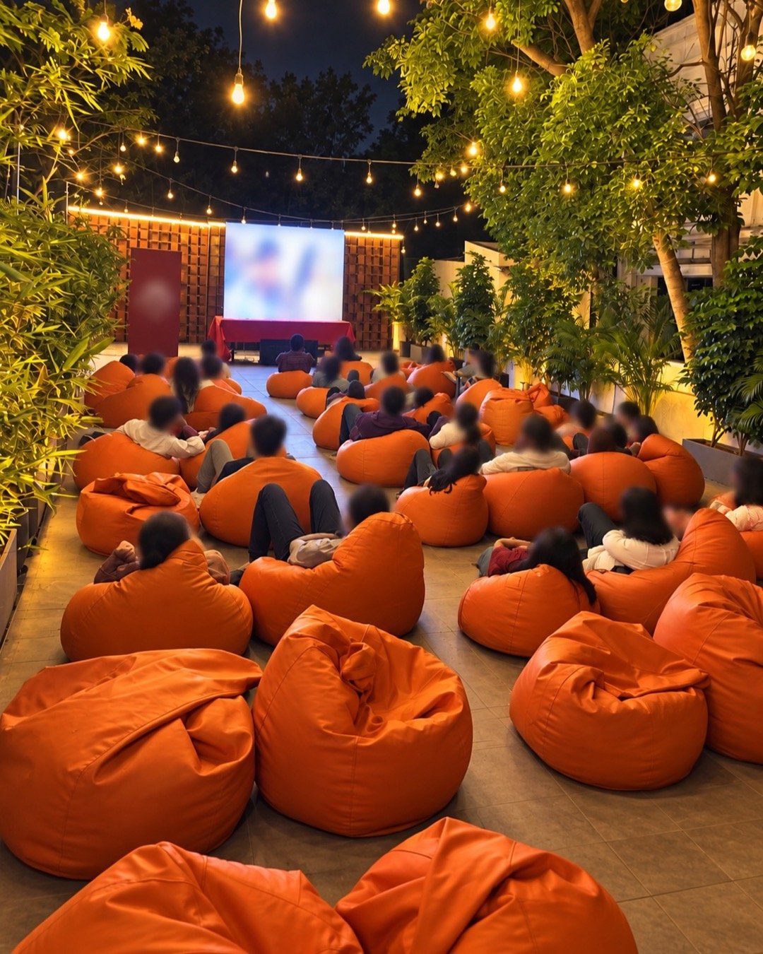 Evening outdoor cinema — completed S.H. Bean Bags event, AI-refined image